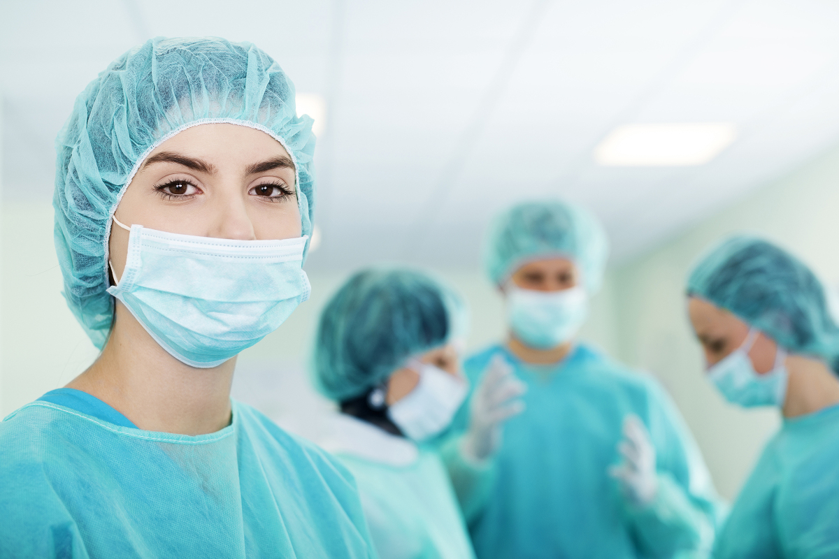 young-female-surgeon-with-medical-team-back-before-surgery